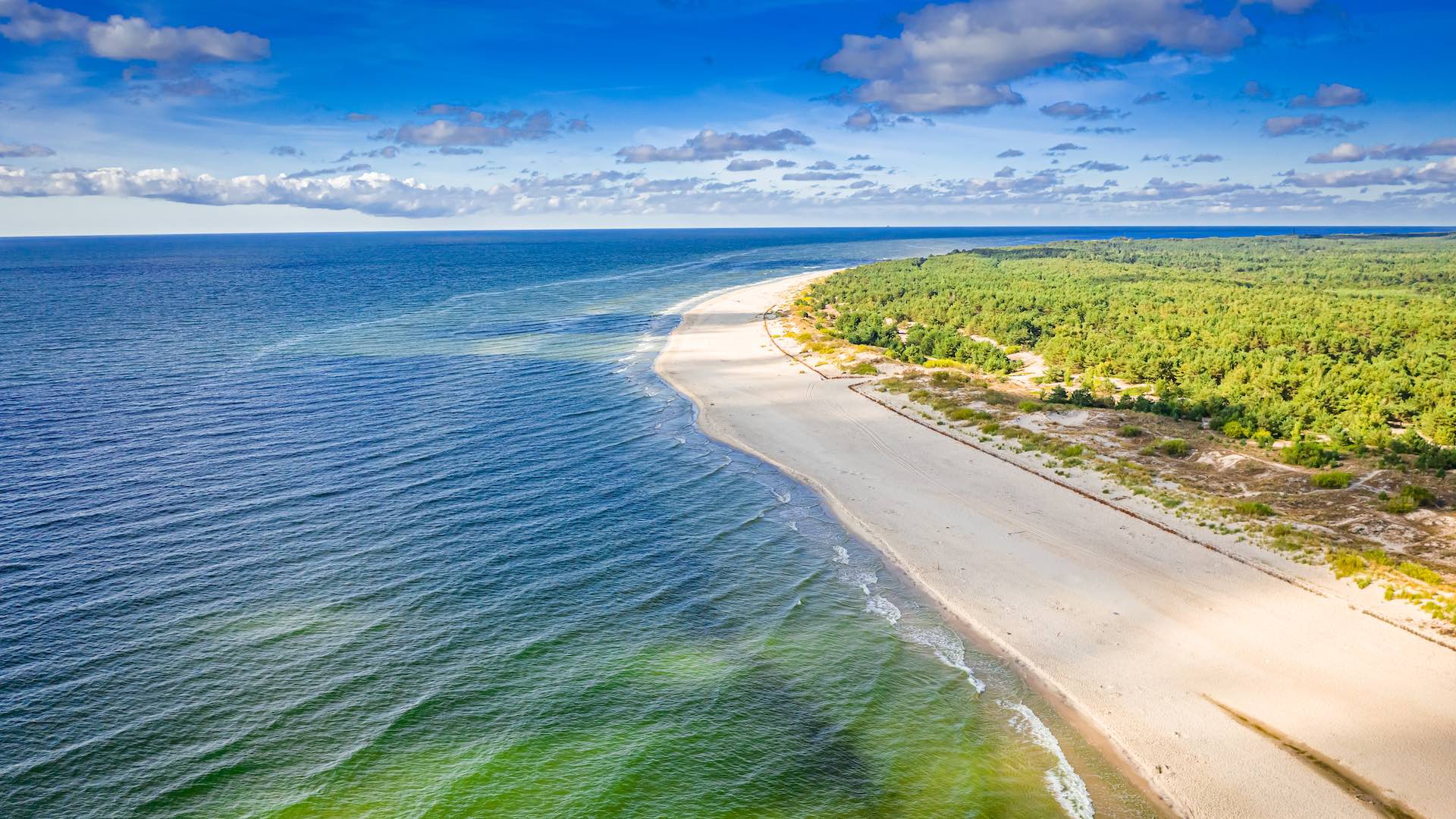 Why is the coastal region in Poland attractive?